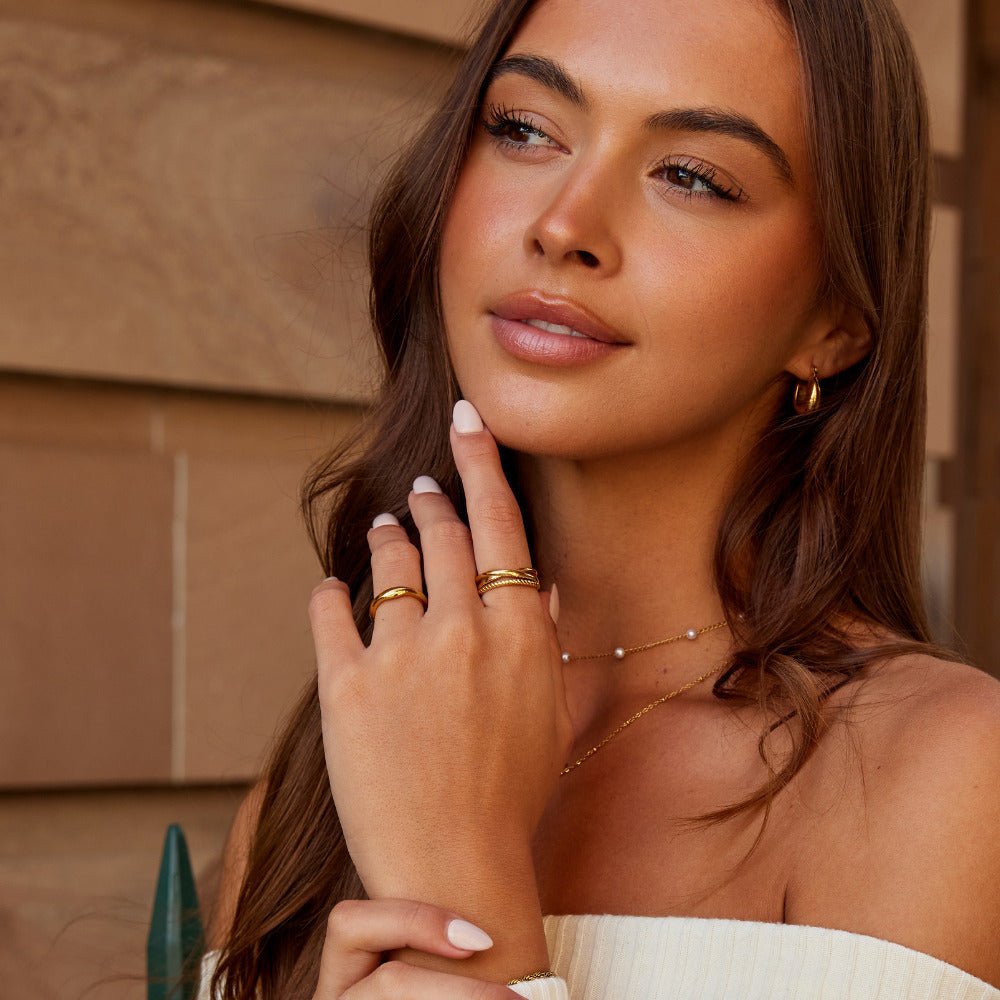 Selira Twisted Cross Ring